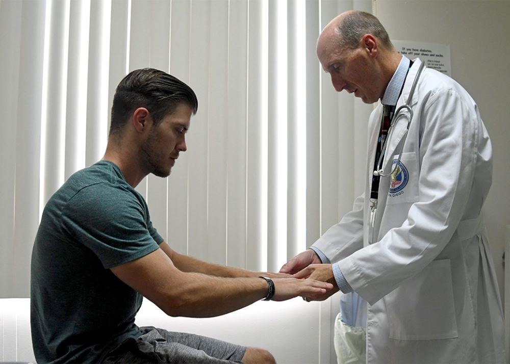 Man consulting with doctor