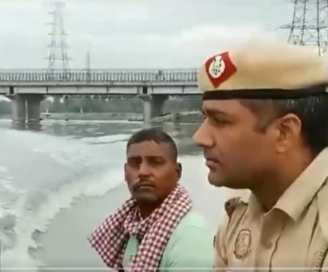Delhi Police patrols Yamuna River by boat